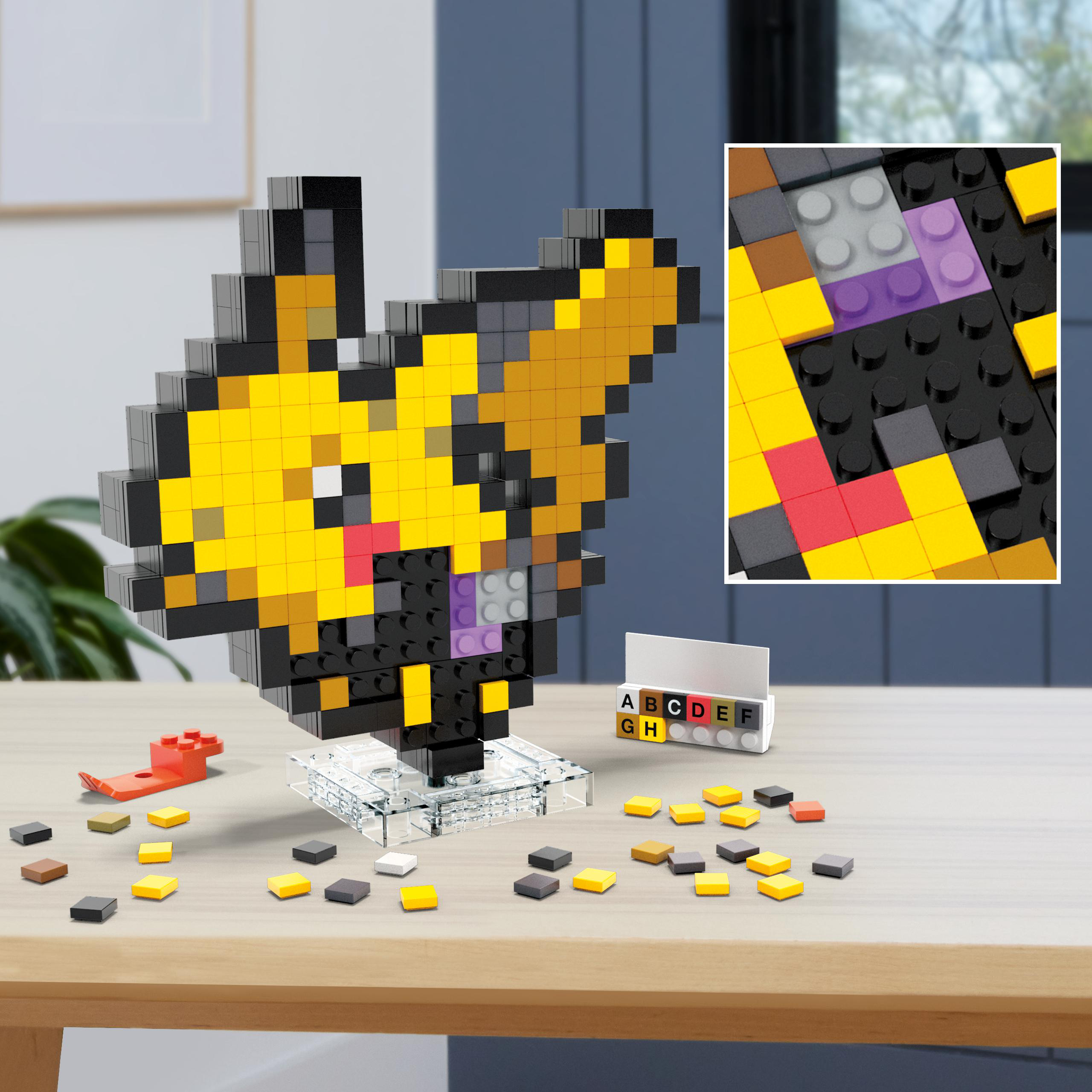 Pikachu-Pixel-Art aus Blöcken, mit Nahaufnahme und Buchstabenblöcken.