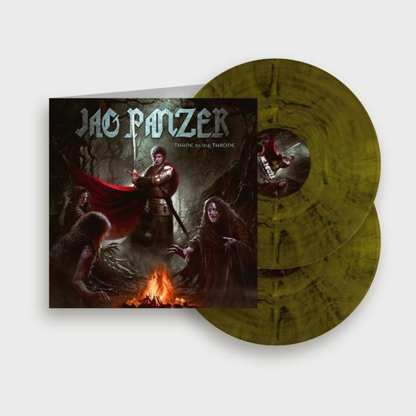 Vinil lemez album borítója és két lemez, harcos és lények művészetével.