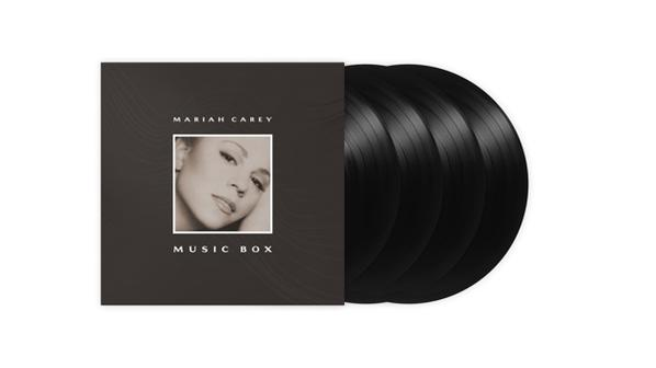 Mariah Carey album borítója fekete bakelit lemezekkel.