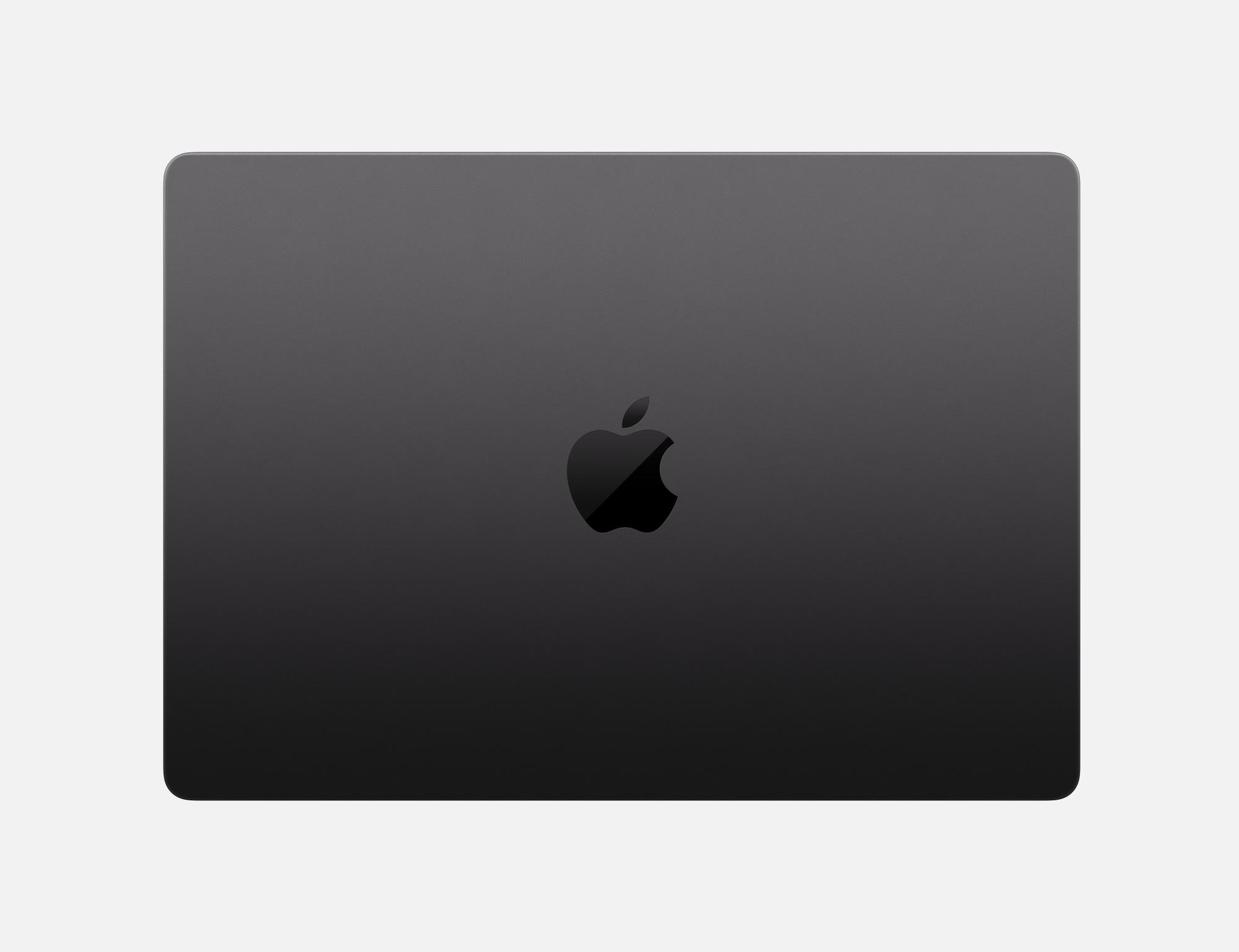 Eine Draufsicht auf einen geschlossenen, dunkelgrauen Apple-Laptop, auf dem das Apple-Logo zu sehen ist.