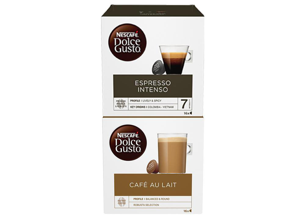 Zwei Schachteln mit Kaffeekapseln. Eine ist Espresso Intenso, die andere Café au Lait. Beide sind Dolce Gusto.