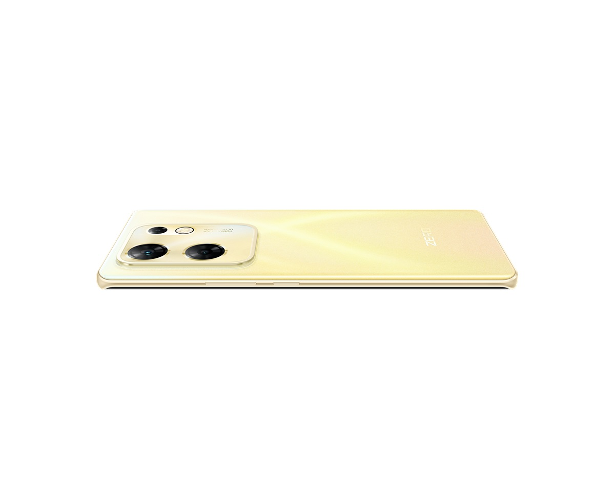 Altın renkli bir akıllı telefon beyaz bir yüzeyde düz duruyor ve yana eğilmiş.