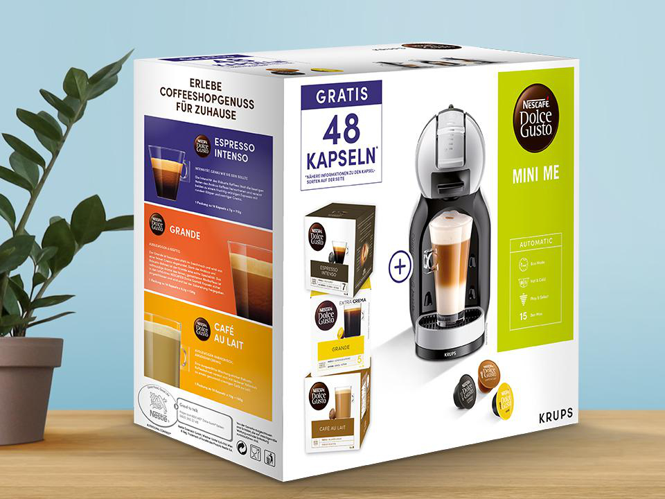 Dolce Gusto Mini Me Kaffeemaschinenbox. Weißes und farbenfrohes Design. Enthält Kapseln.