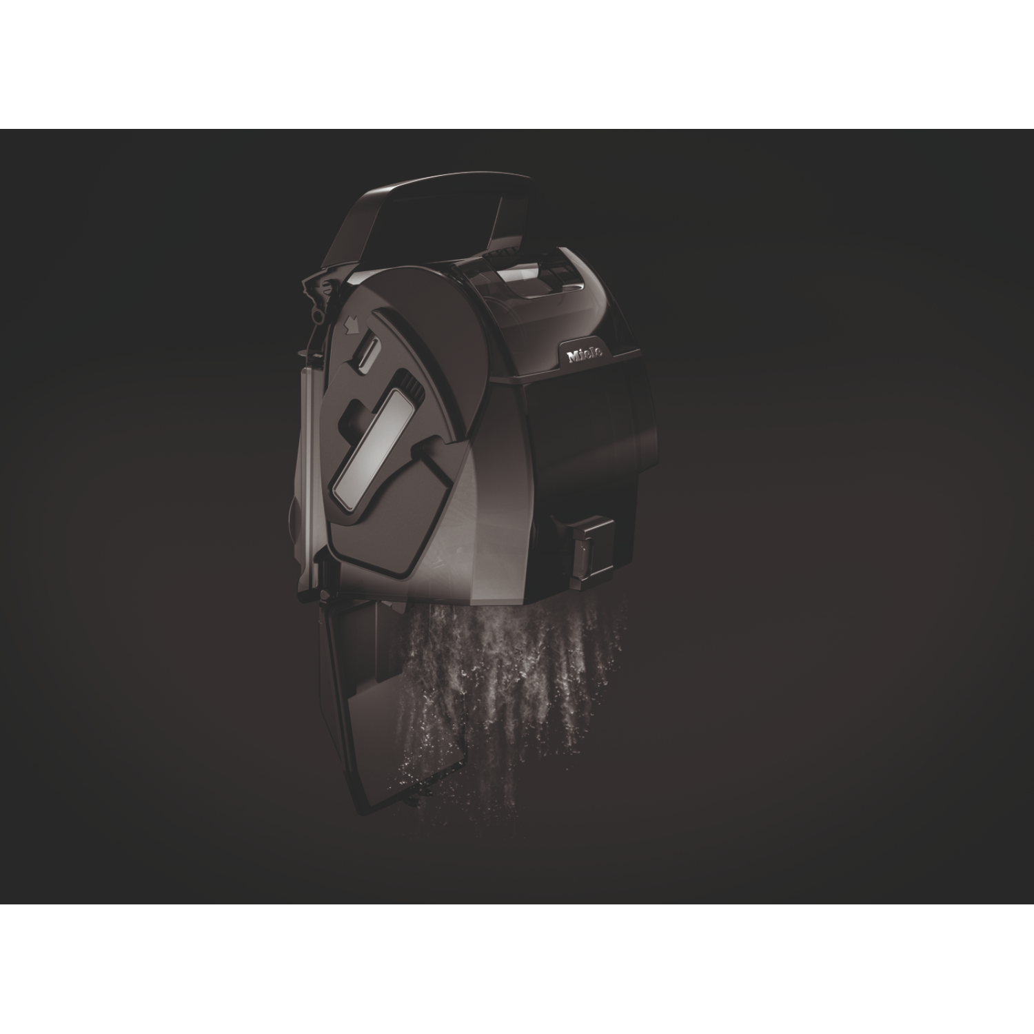 A black vacuum cleaner with visible dust particles. The device appears to be expelling air and dust.