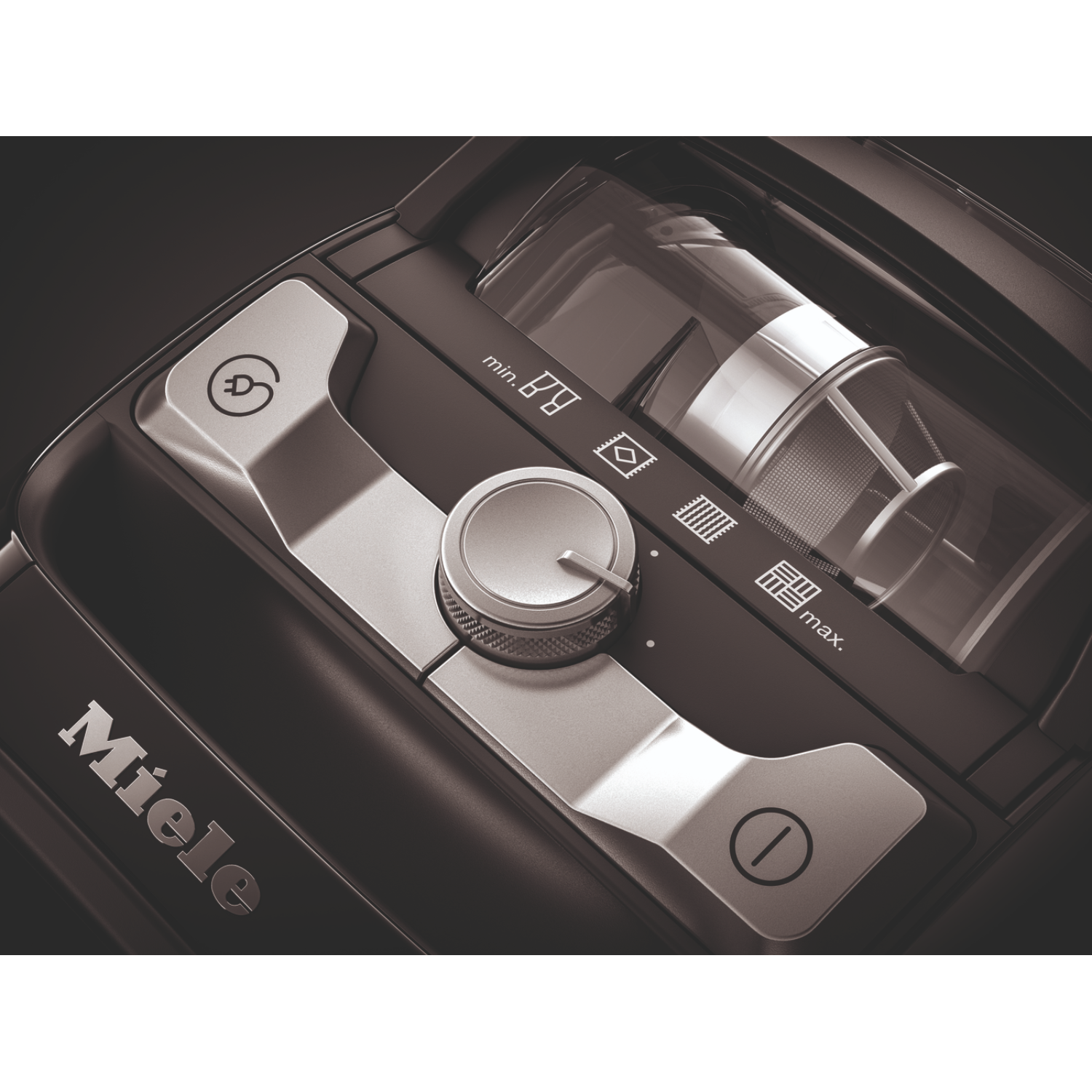 Vacuum cleaner controls, black with silver accents. Dial and buttons.