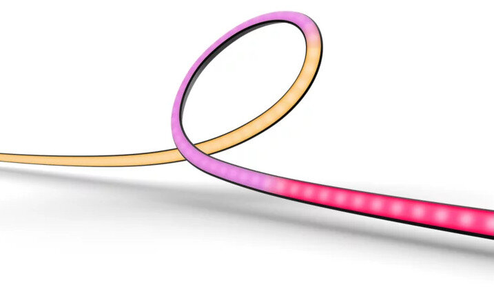 Elastyczny pasek świetlny, z sekcjami różowego i żółtego światła, na białym tle.