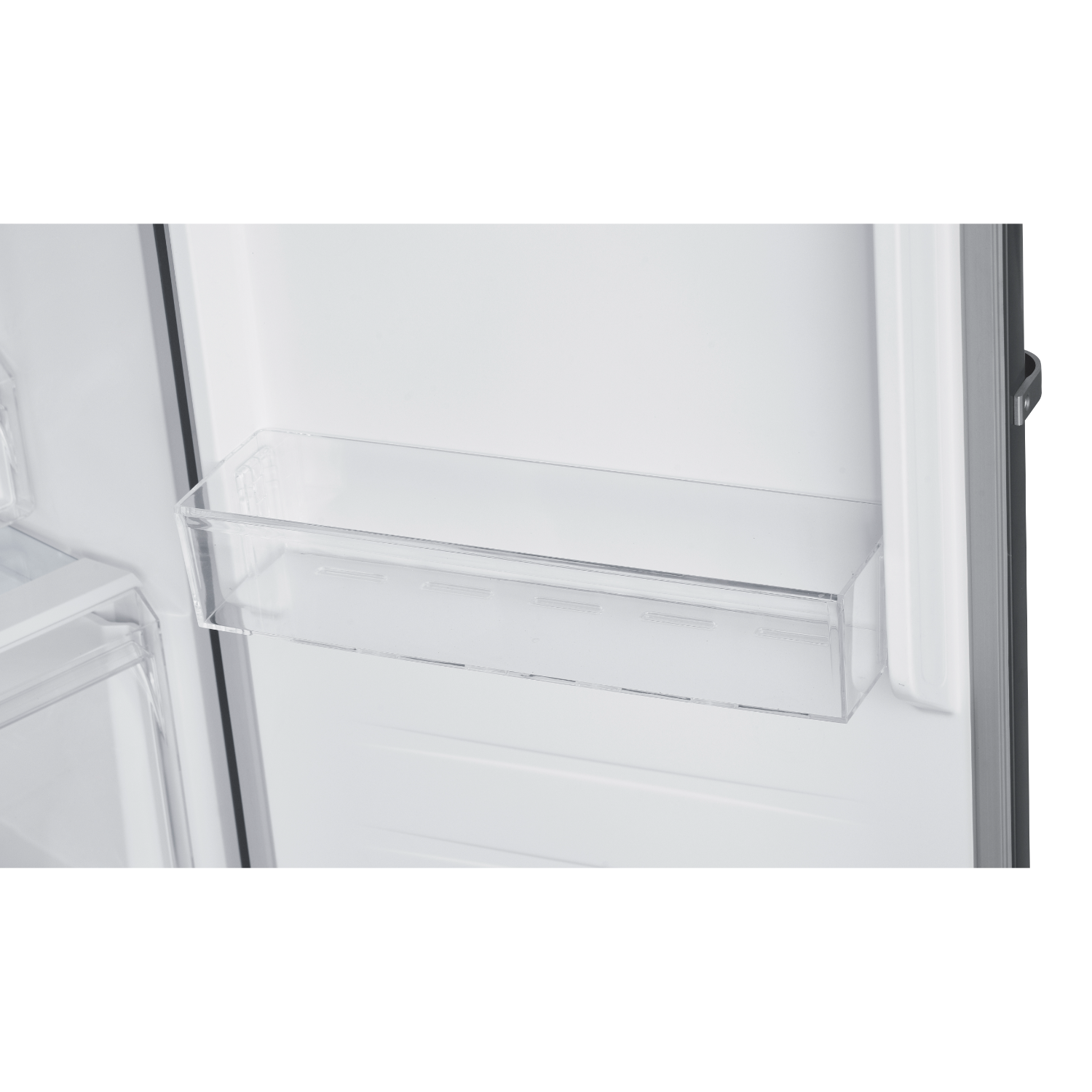 Clear plastic shelf inside a refrigerator. White interior.