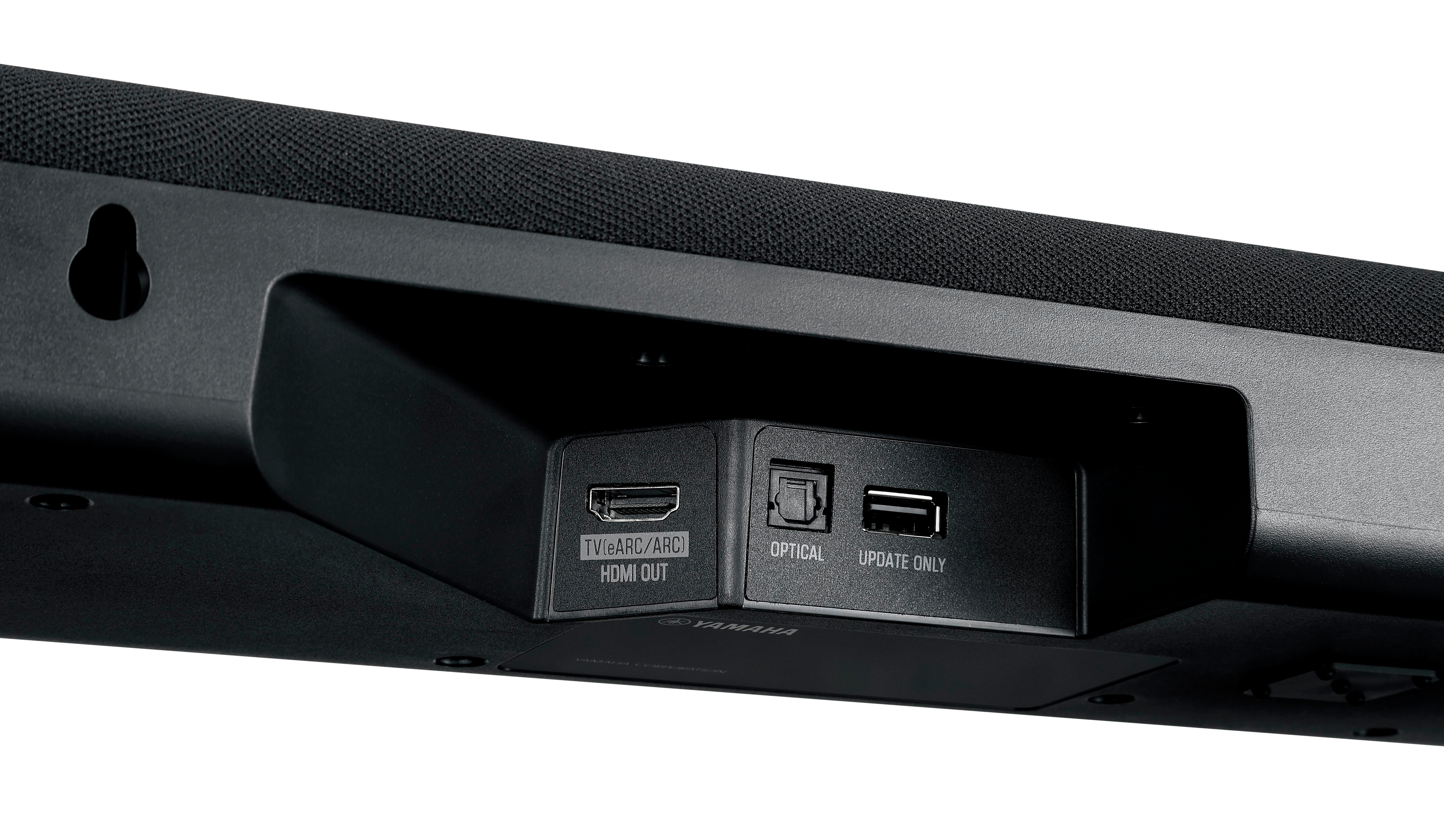 Nahaufnahme der Rückseite einer Soundbar mit HDMI-, optischen und USB-Anschlüssen, alle schwarz.