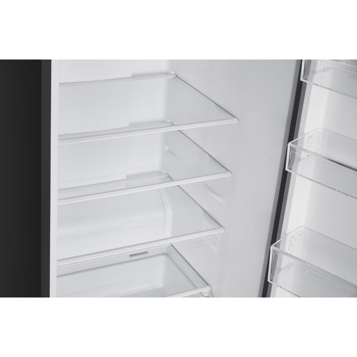 The inside of a refrigerator with glass shelves, and a white interior.