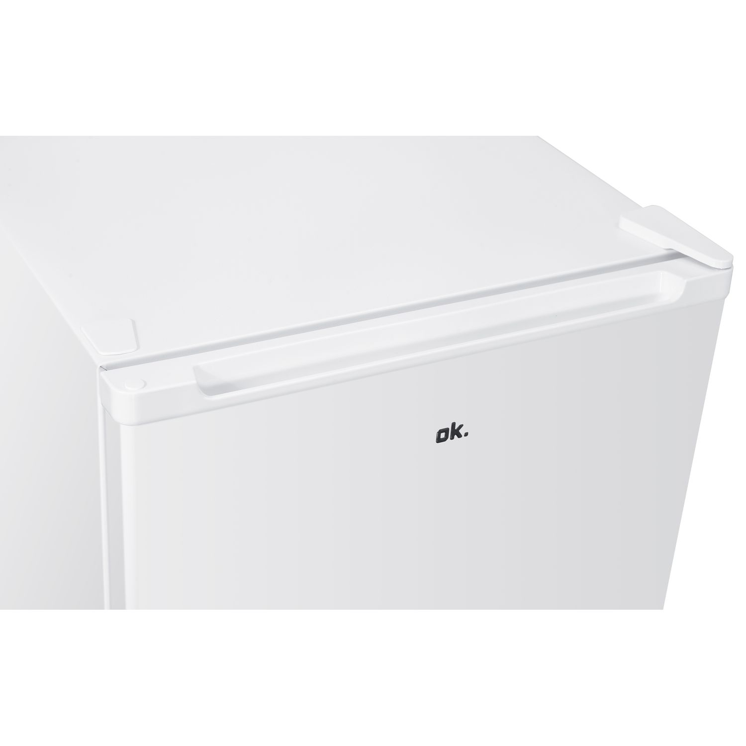 A close-up of a white refrigerator with the word "ok." on the door.