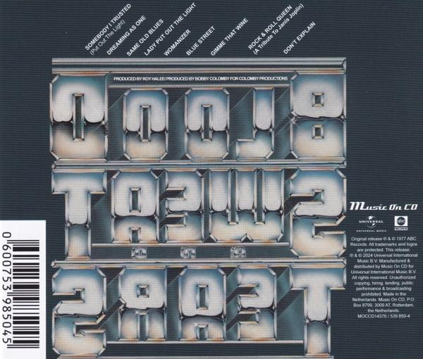 CD borító. Ezüst design, 'TOP 2001' felirattal. Fekete-fehér csíkok balra.