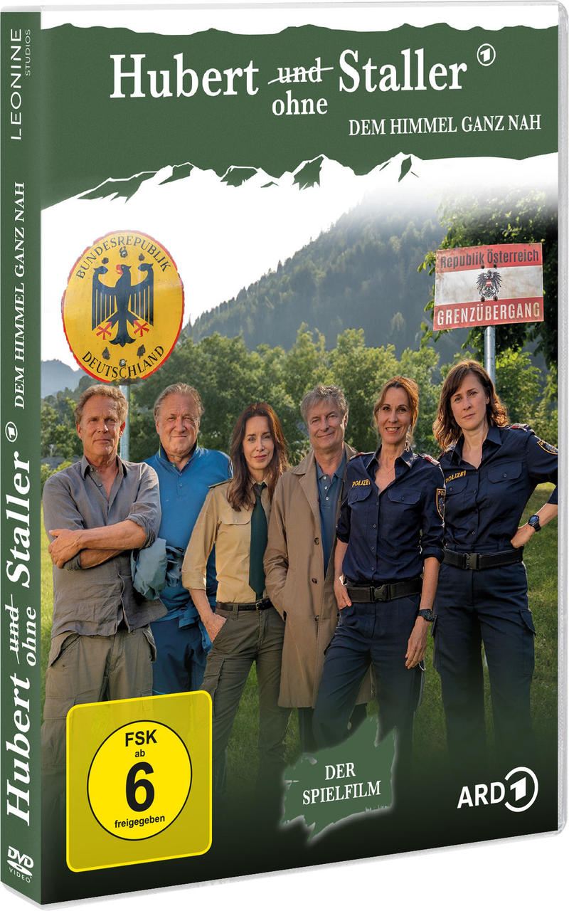 DVD-Cover für 'Hubert und Staller'. Personengruppe. Grüner und weißer Text auf dunklem Hintergrund.
