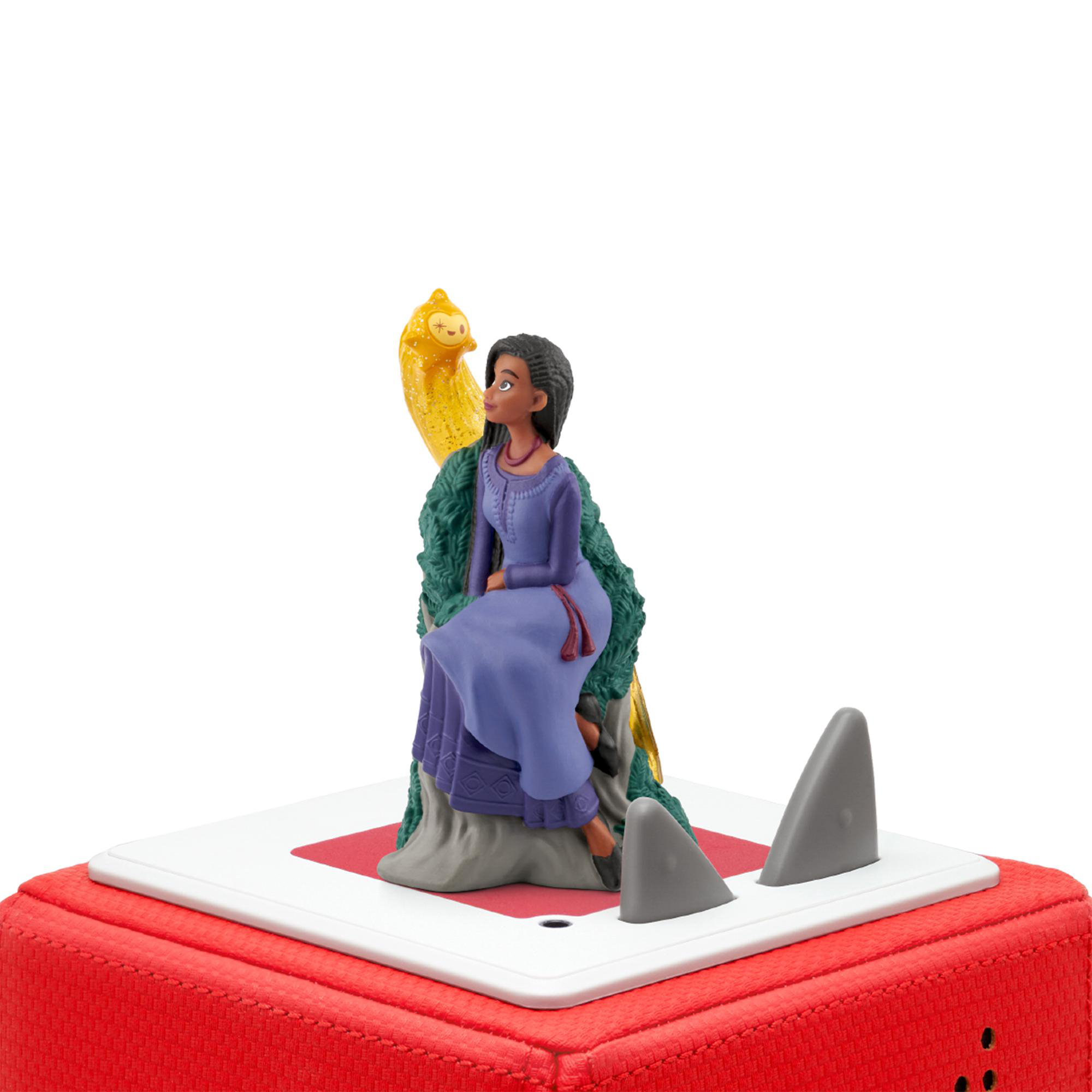 Eine Figur einer Frau, die mit einem Vogel sitzt. Die Figur steht auf einer roten Basis, mit weißem Hintergrund.