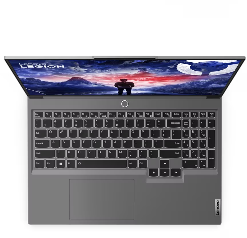 Laptop auf schwarzer Oberfläche geöffnet. Bildschirm zeigt eine Landschaftsszene.