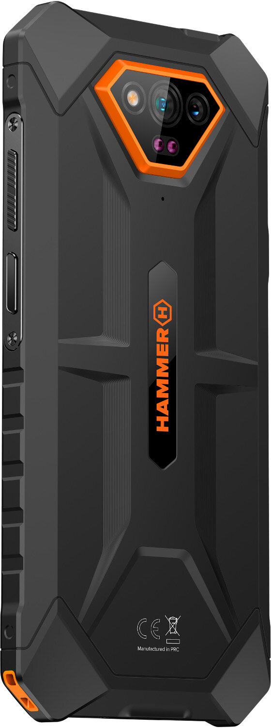 Czarny wytrzymały telefon z pomarańczowymi akcentami. Ma moduł aparatu, przyciski i logo Hammer.