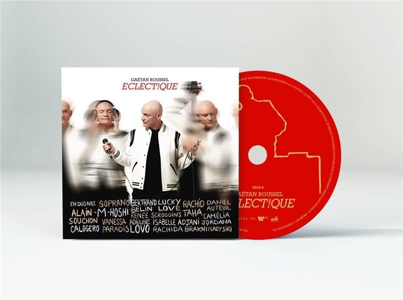 Boîtier de CD avec une photo d'un homme et le CD lui-même avec du texte de Gaëtan Roussel.