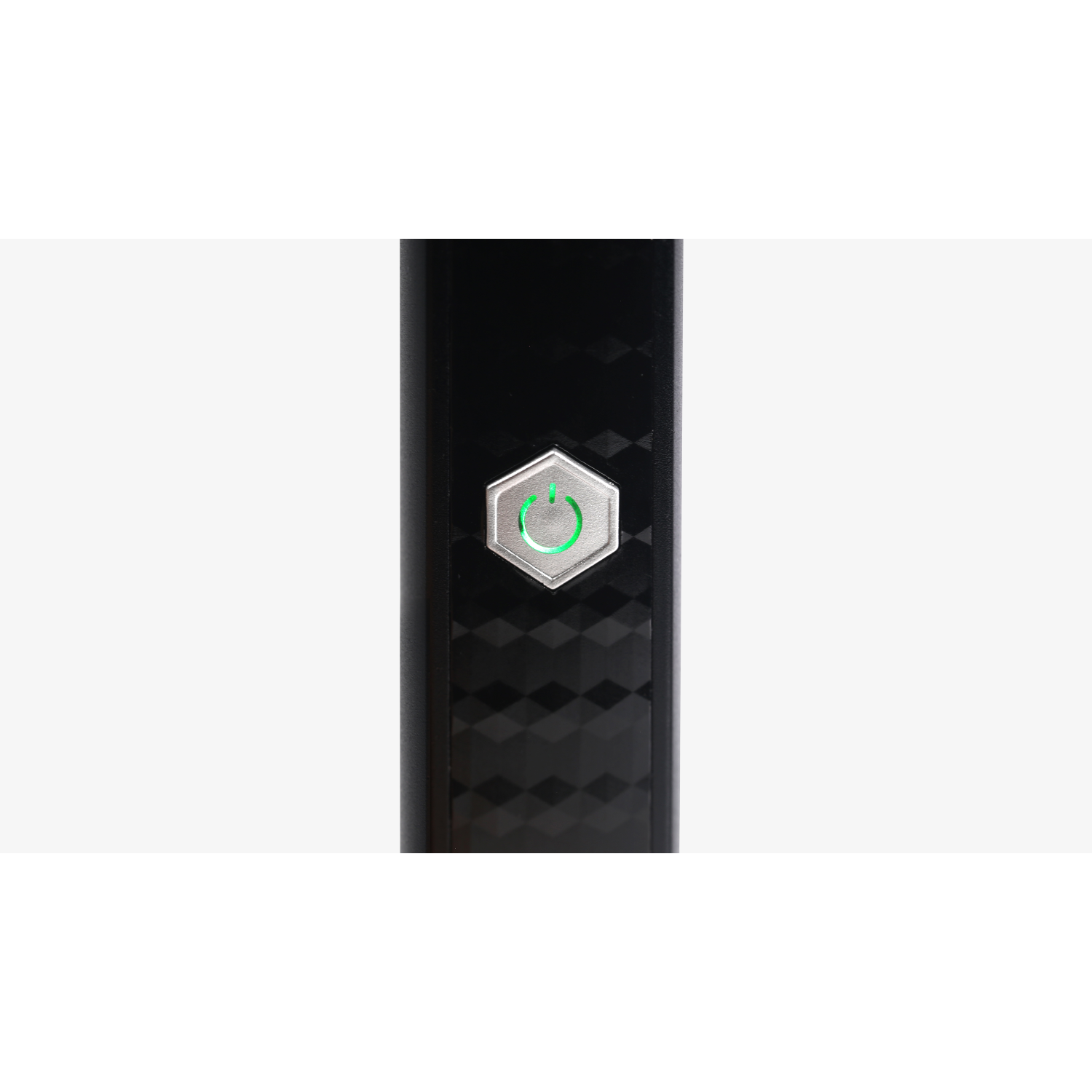 Close up of a black device with a power button illuminated with a green light.