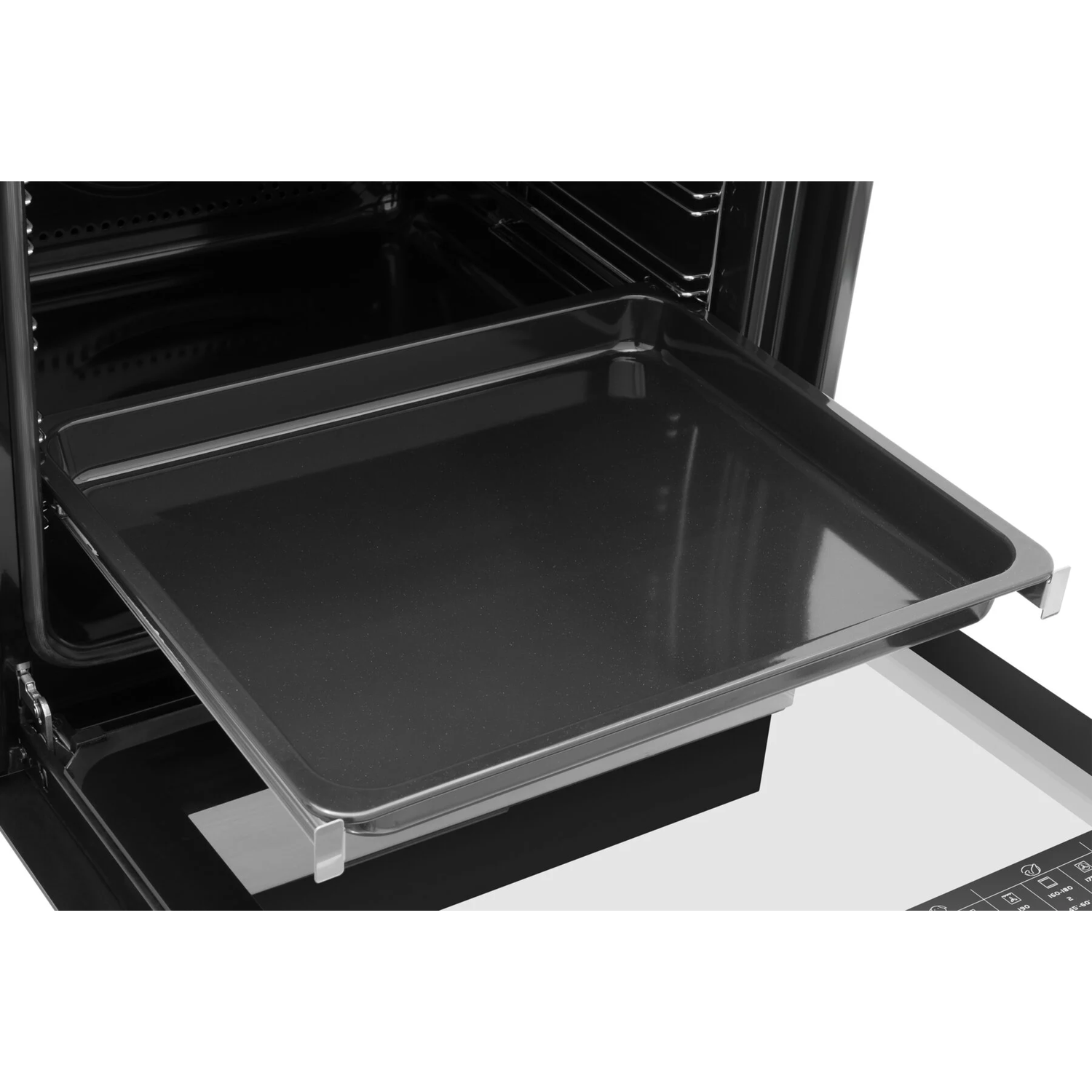 Black oven tray pulled out. The oven's interior is visible. The tray is in the foreground.