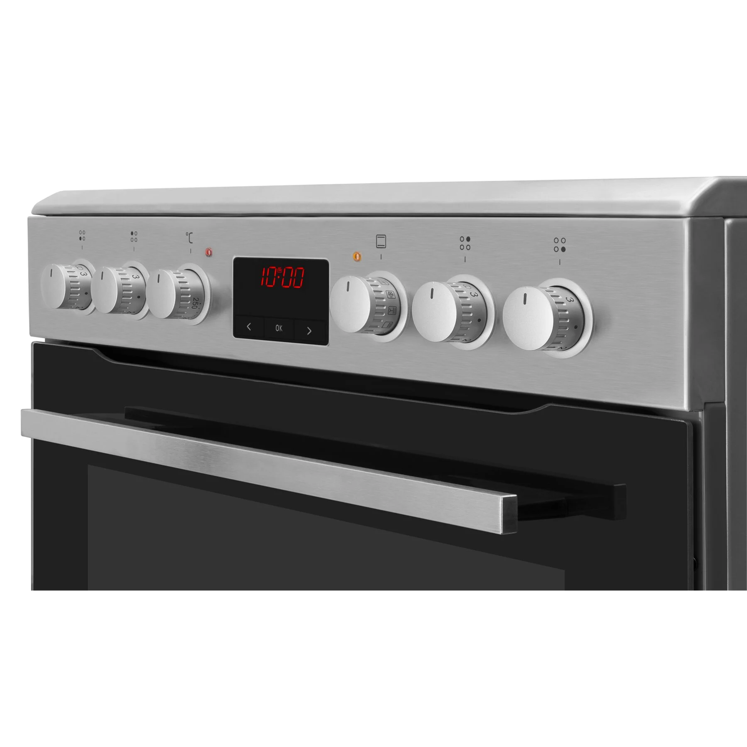 Close-up of a silver oven control panel with knobs, a display showing 10:00, and a handle.