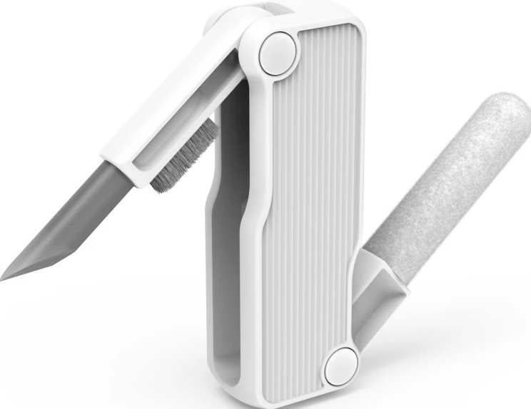 Multi-outil blanc avec lame, brosse et rouleau, sur fond blanc.
