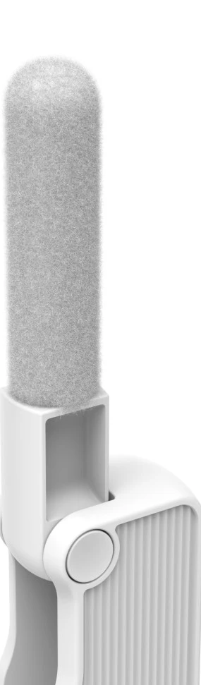 Brosse de nettoyage blanche avec une tête cylindrique et une poignée.
