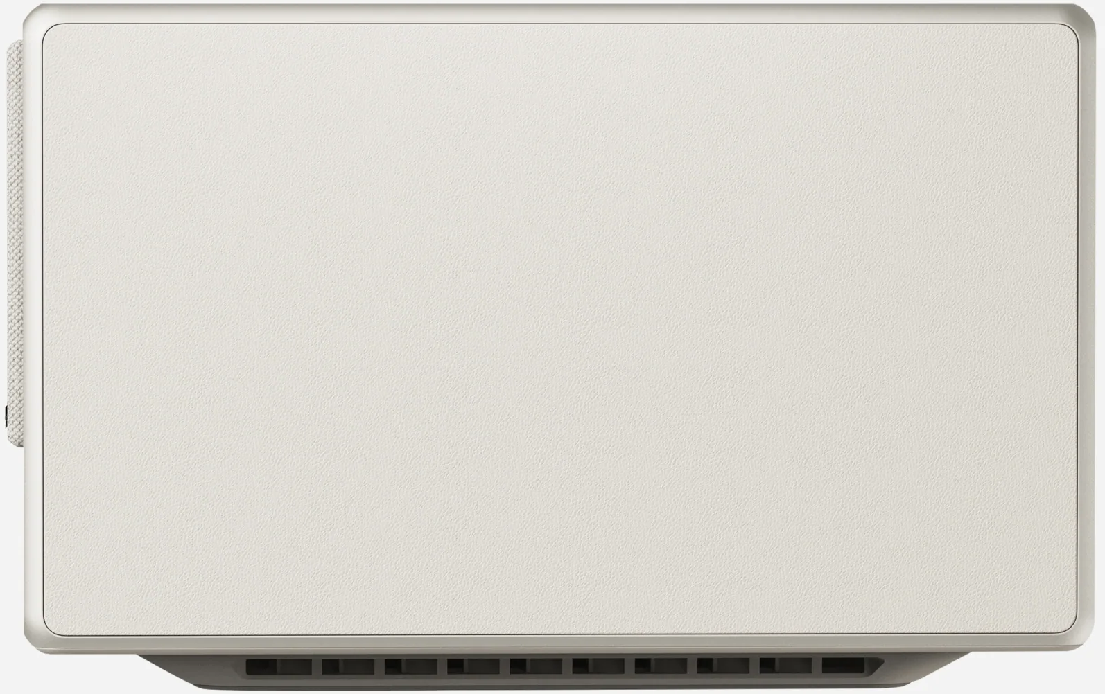 Ein weißer Monitor, Draufsicht, auf weißer Oberfläche.