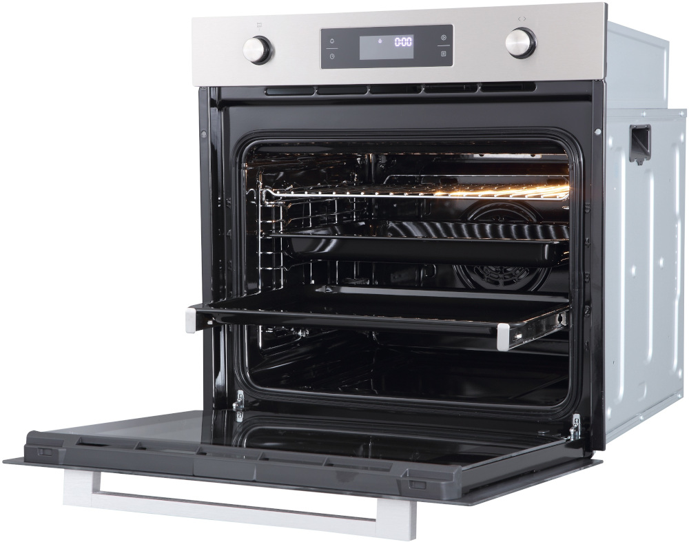 Oven interior with open door. Trays inside.