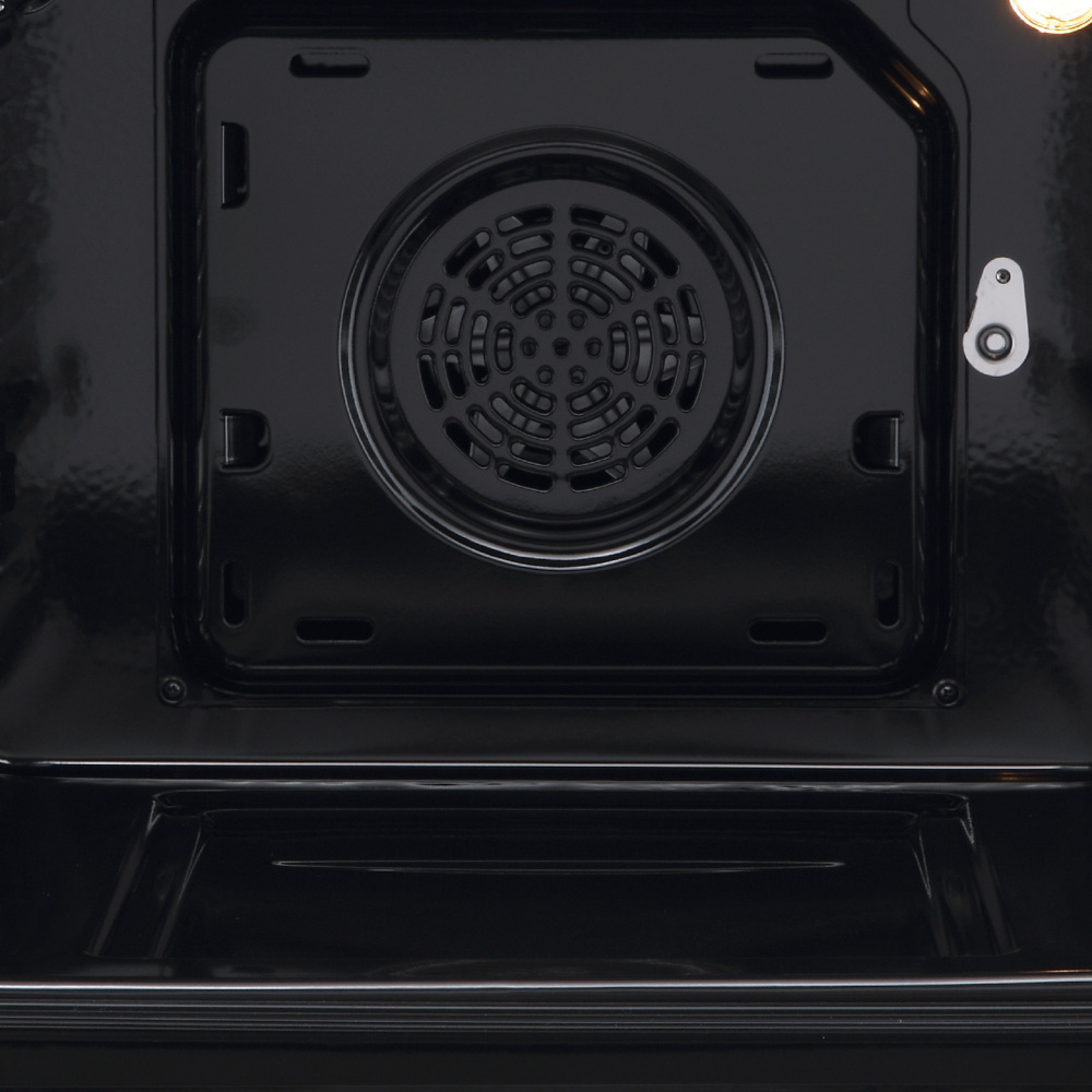 Black oven interior with a fan and lighting.