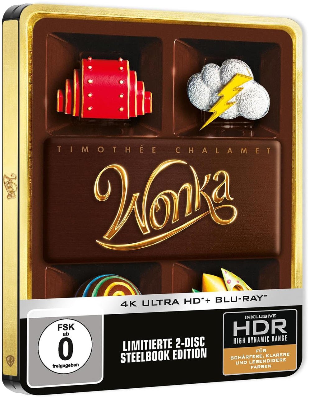 Wonka-Film auf Blu-ray. Buntes Cover. Vier Bilder von Requisiten. Goldene und braune Box.
