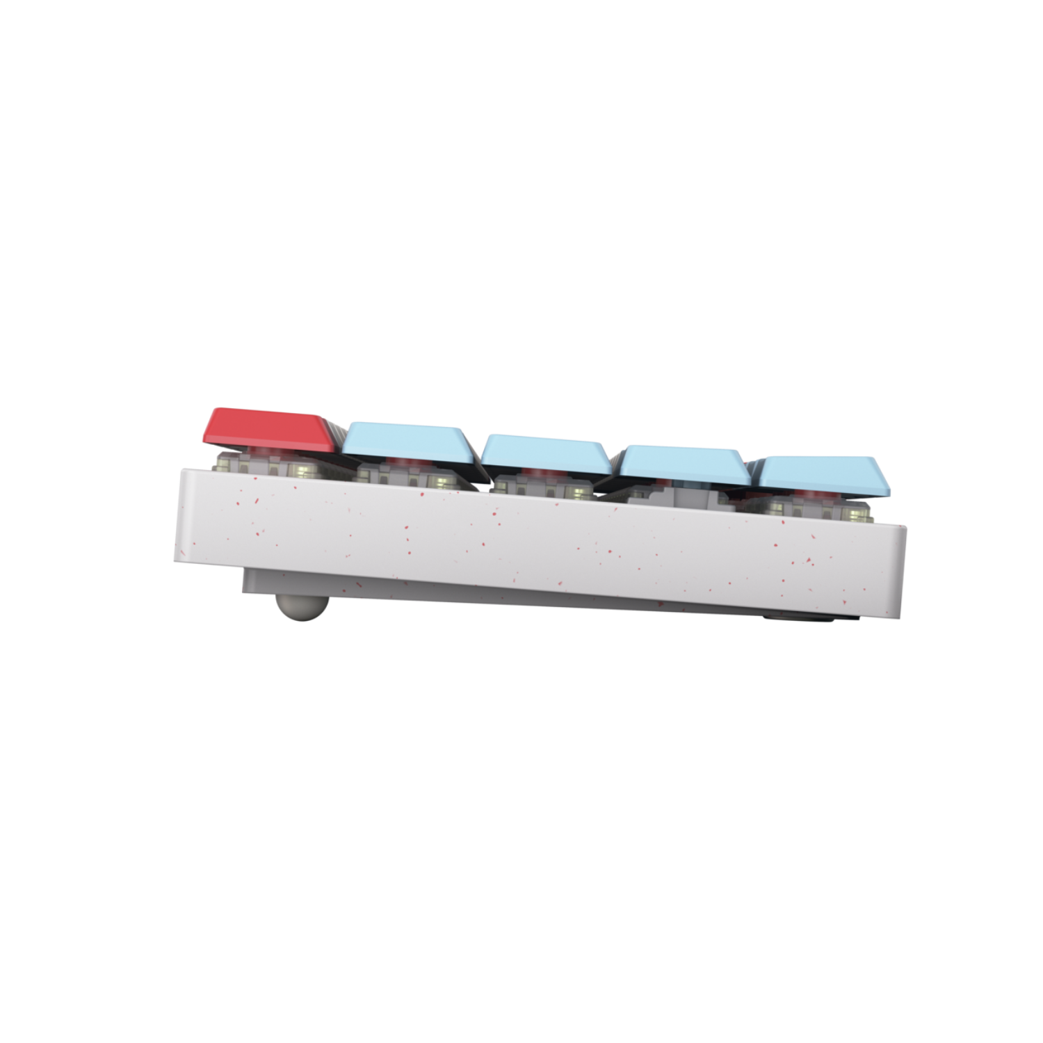 A close-up of a keyboard with red and light blue keycaps. It sits on a white base with red speckles, against a black background.