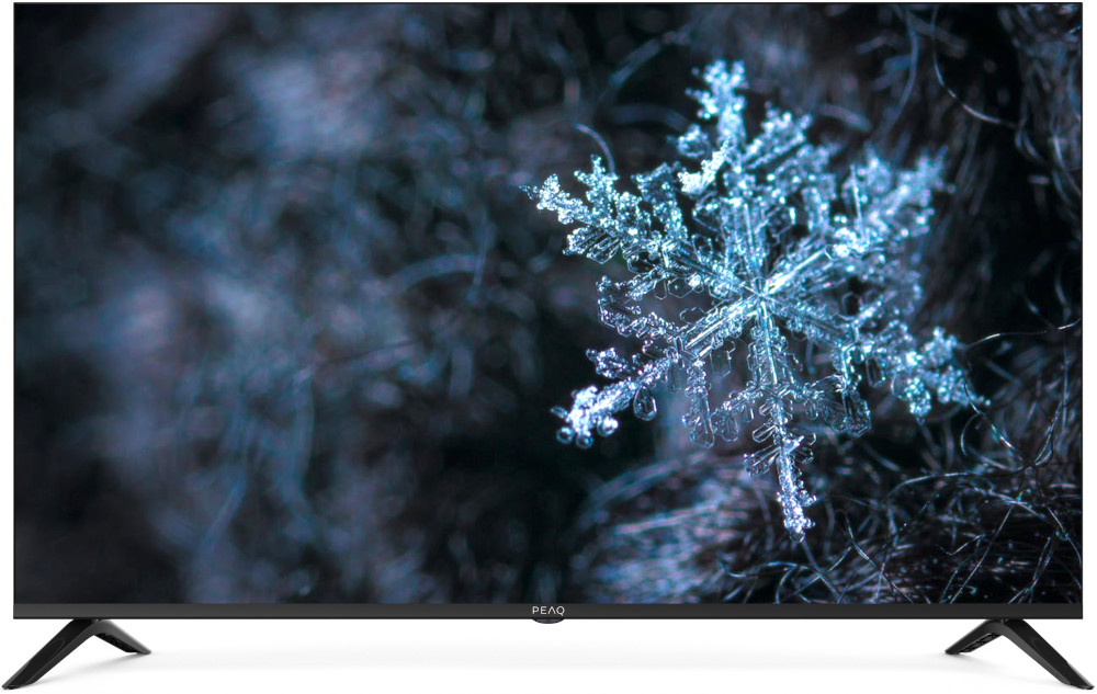 Een tv-scherm toont een macro-opname van een sneeuwvlok.