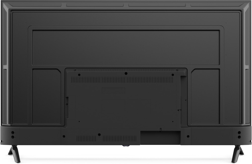 De achterkant van een zwarte flatscreen-tv op poten, met verschillende poorten en een gestructureerd oppervlak.