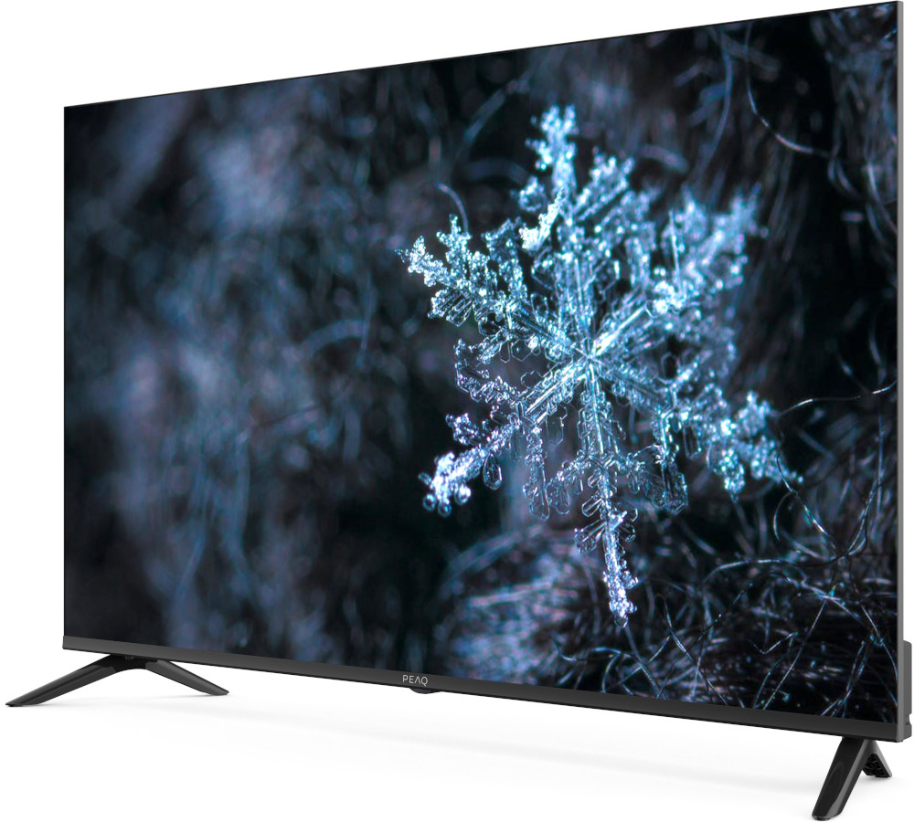 Groot tv-scherm met een close-up van een sneeuwvlok op een donkere achtergrond.