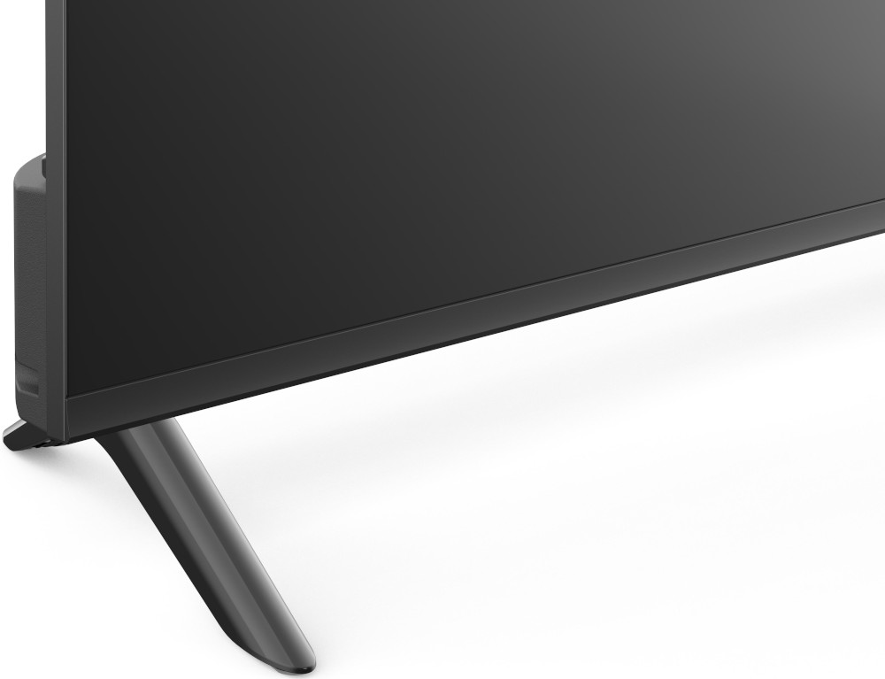 Close-up van een zwarte tv, met de voet en standaard.