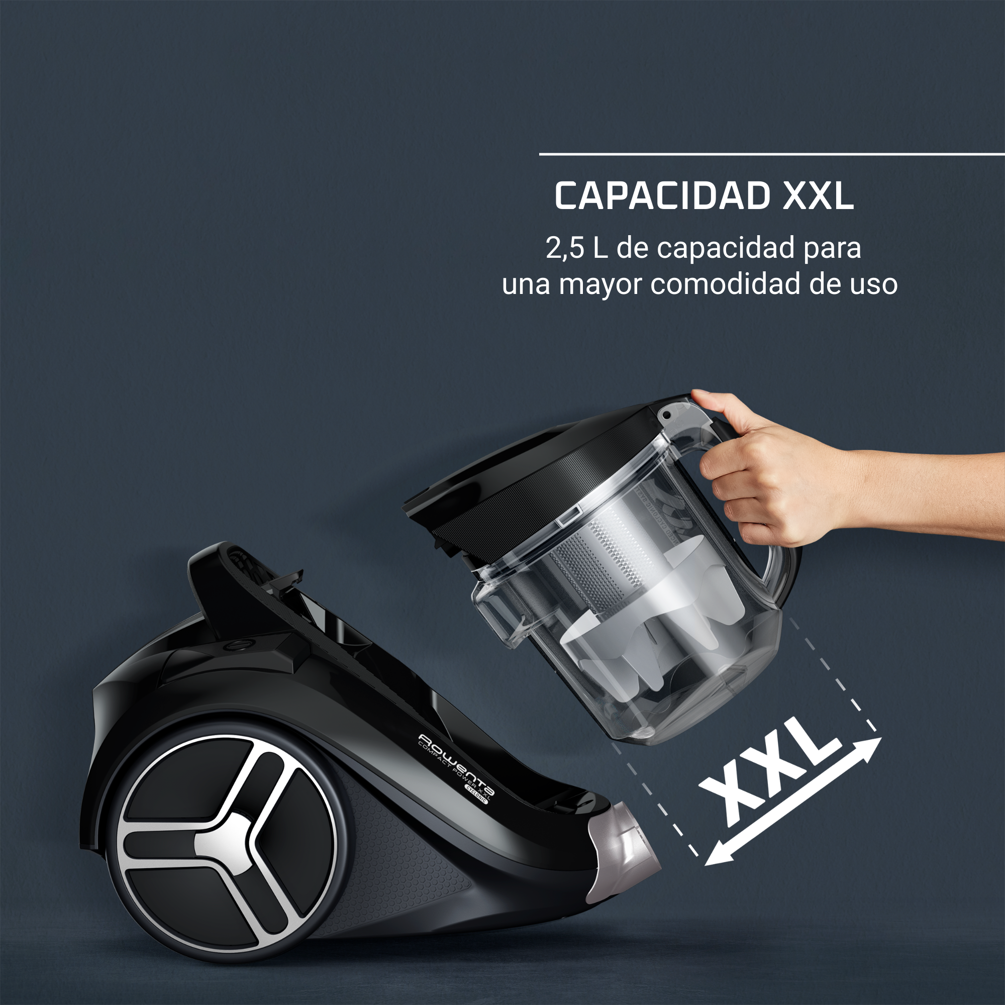 Aspiradora negra, contenedor transparente separado, con etiqueta 'XXL', texto.