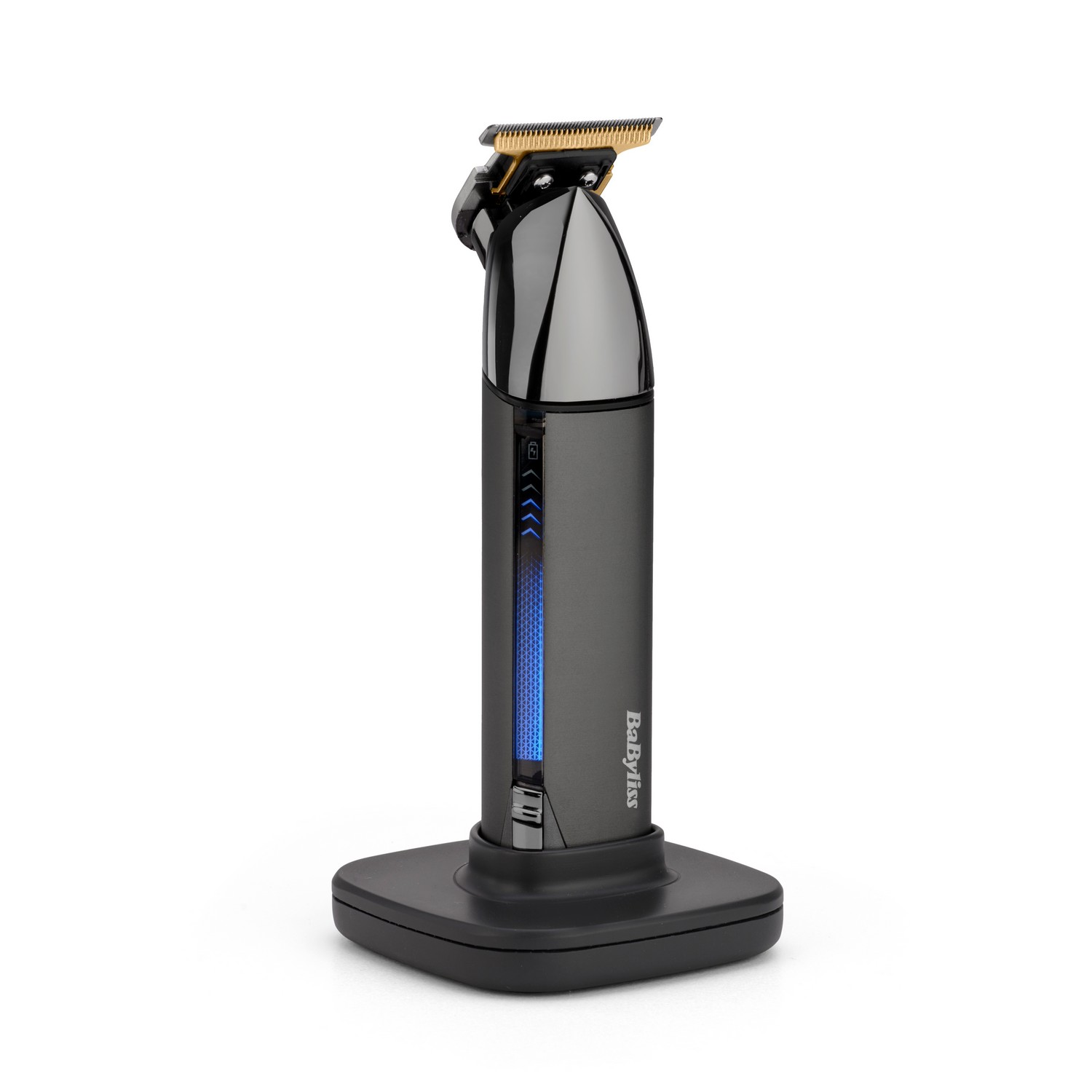 A black and silver electric hair trimmer on a black charging base.