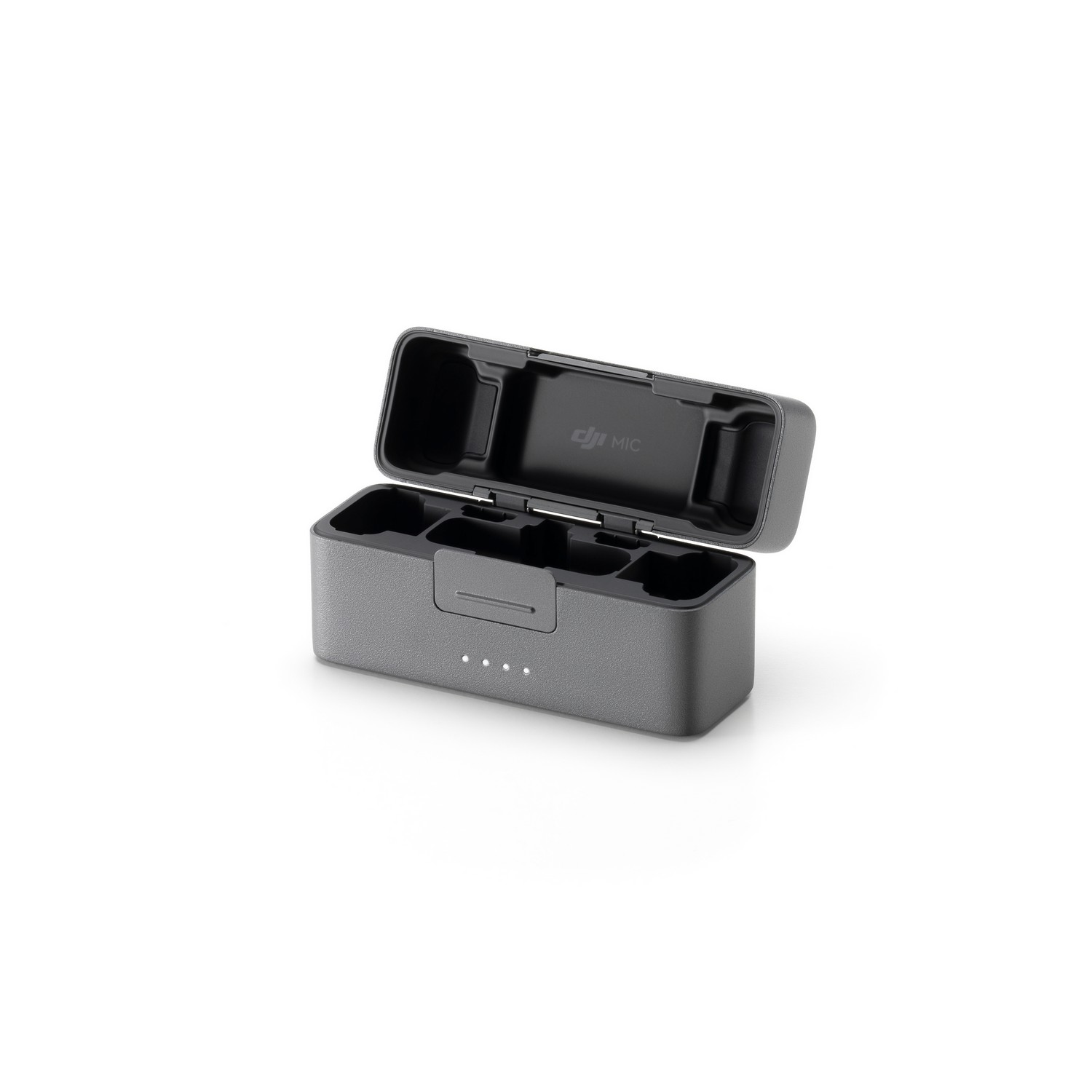 DJI Mic charging case, open. The case is gray and has compartments for the mics.