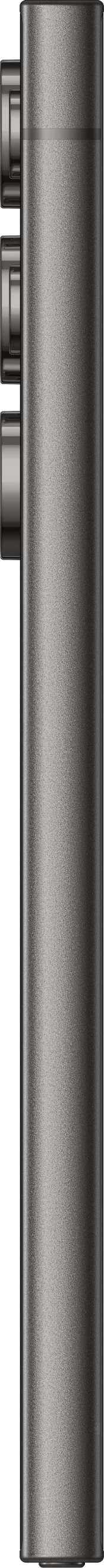 Un objet cylindrique et métallique sur fond noir.