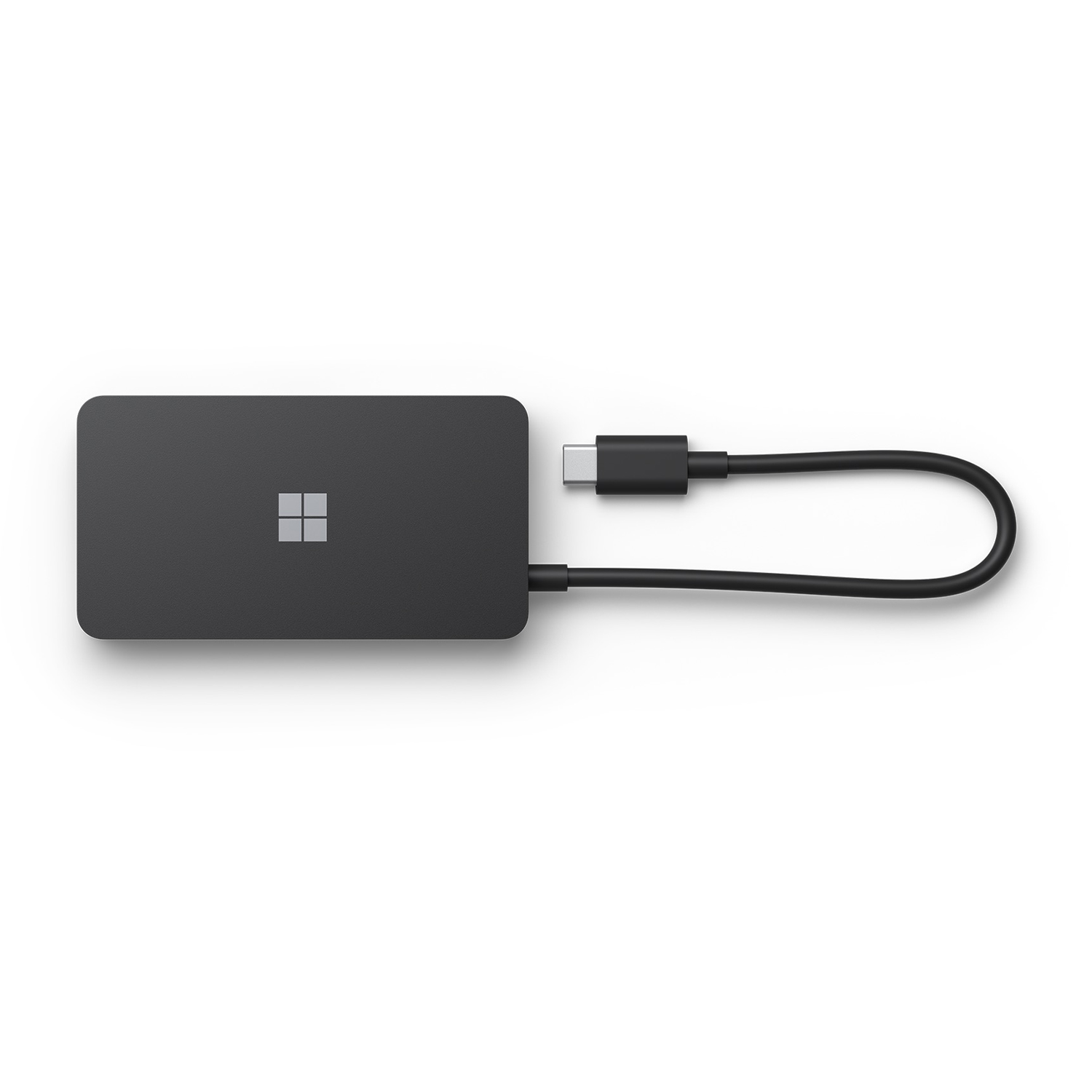 Un hub USB-C Microsoft nero con un cavo collegato a una porta USB-C.