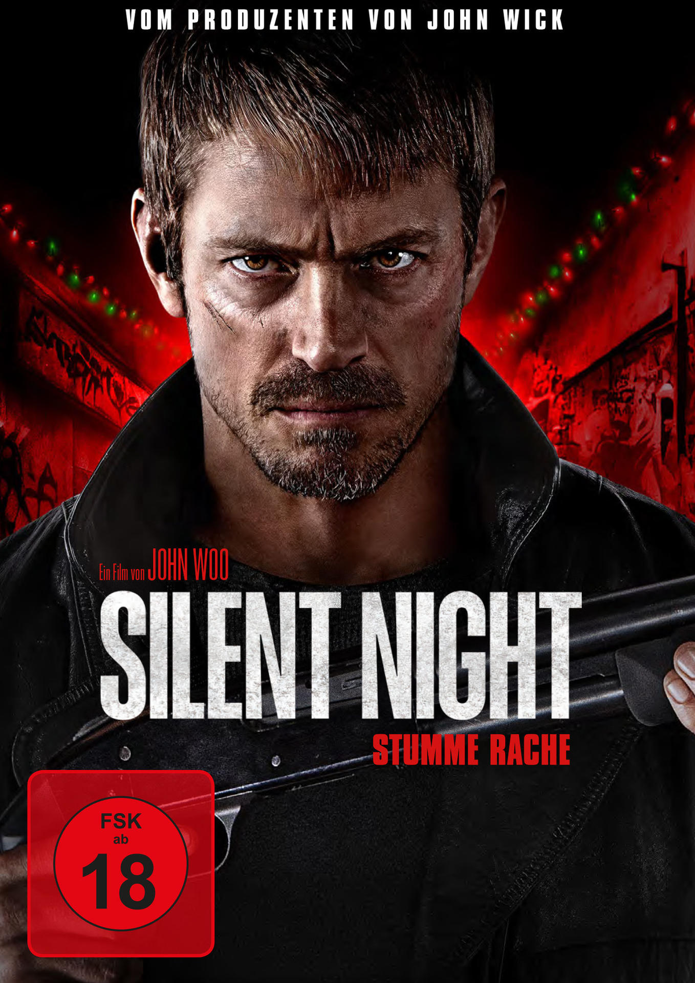 Filmposter für 'Silent Night'. Ein Mann mit Schrotflinte, dunklem Mantel und Titel.