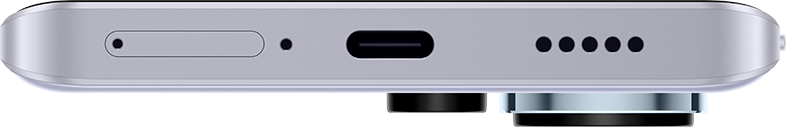 Egy telefon alsó szélének közeli képe, amelyen USB-C port és hangszórólyukak láthatók.