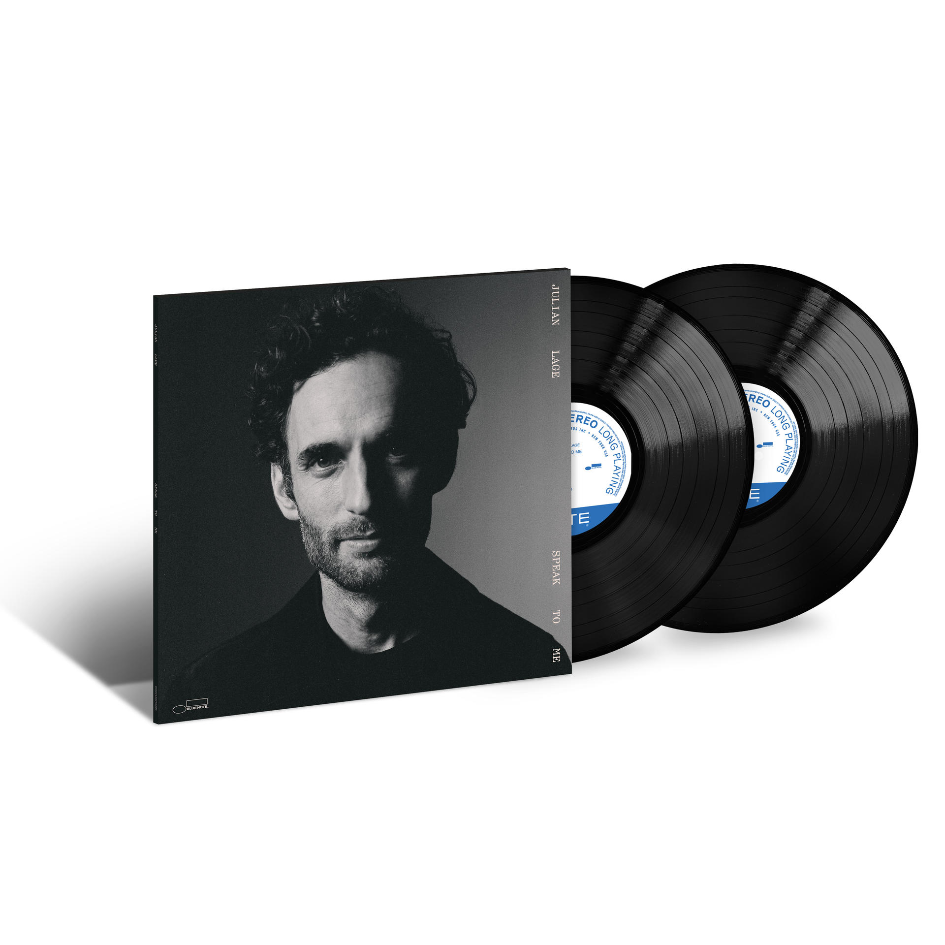 Albumcover und Schallplatten. Das Cover ist schwarz-weiß mit einem Männergesicht.