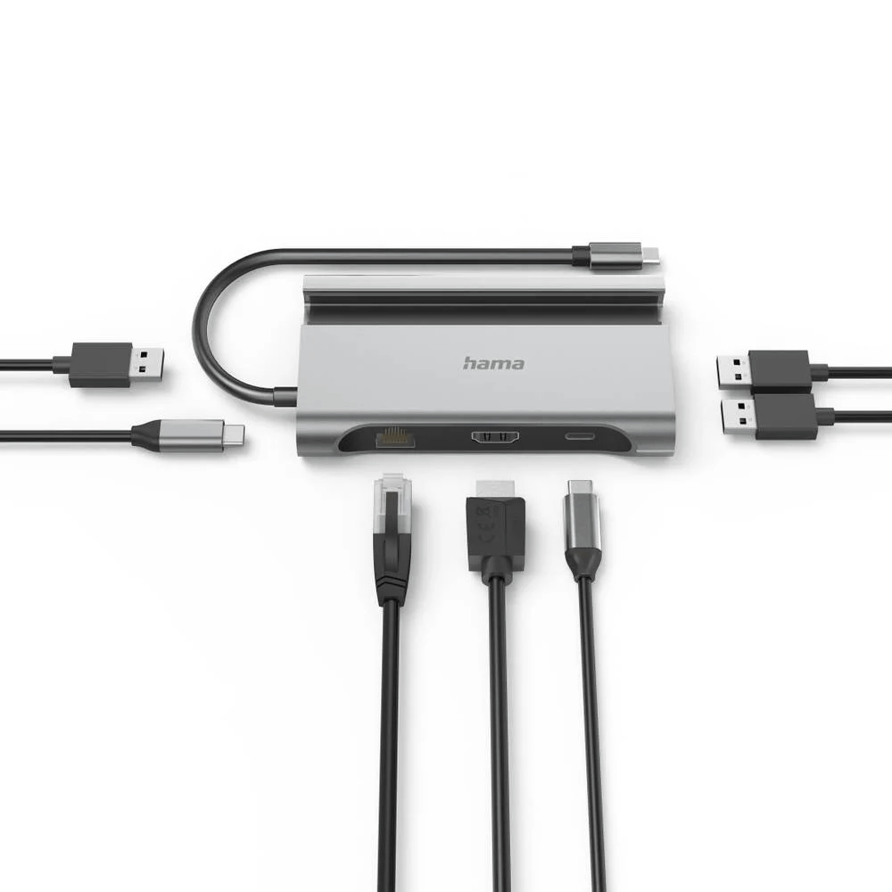 Base de conexión Hama plateada con varios cables: USB, HDMI y Ethernet sobre una superficie blanca.