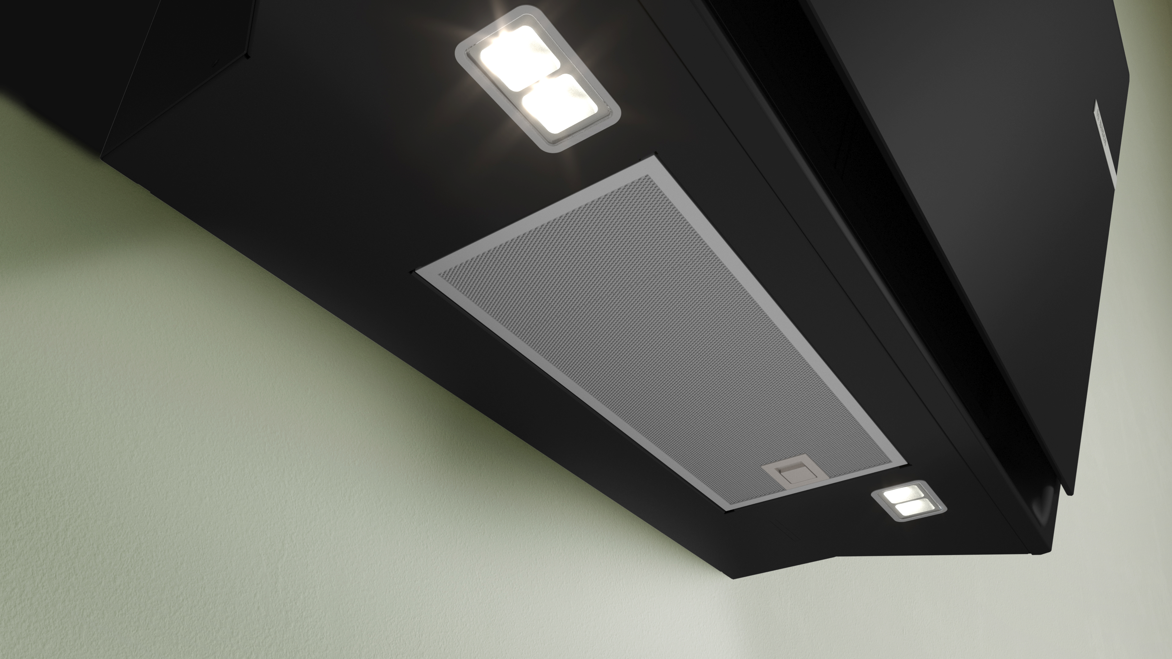 Unteransicht einer schwarzen Dunstabzugshaube mit Lichtern. Die Lichter sind quadratisch und hell.