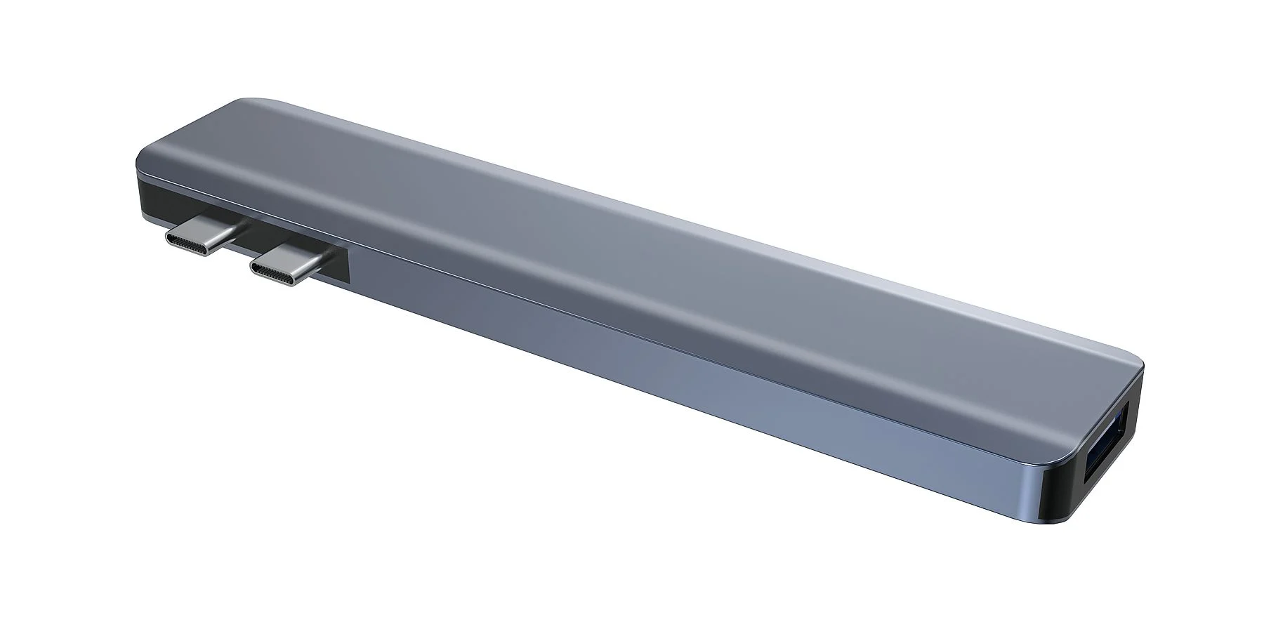 Ezüst USB-C hub, három USB-C porttal és egy USB porttal. Fehér háttér.