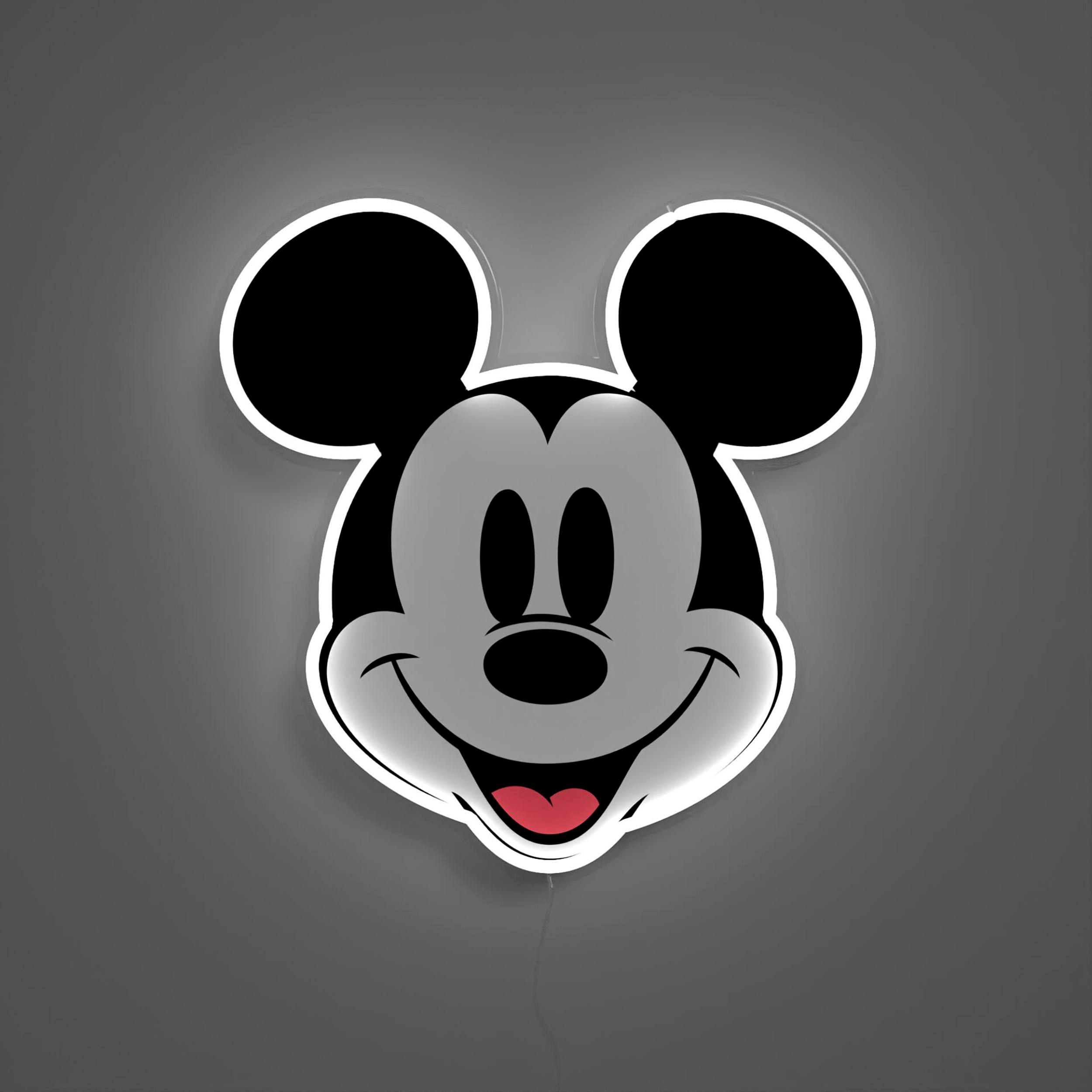 Mickey Mouse Kopf Neon-Schild. Schwarze Ohren und Gesicht, weißer Umriss, rote Zunge.