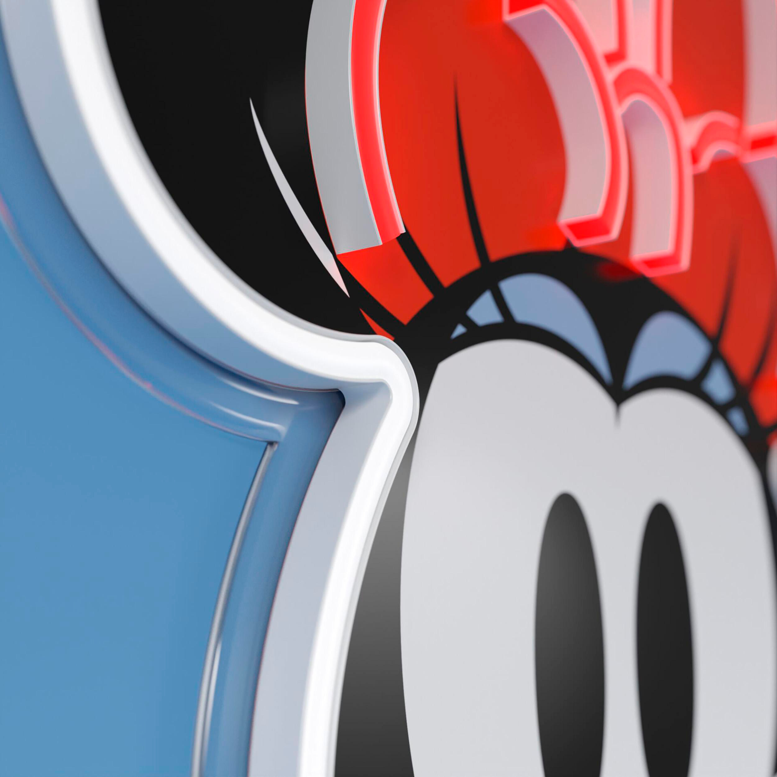 Nahaufnahme eines Minnie-Mouse-Designs mit roter Schleife und weißer Umrandung.
