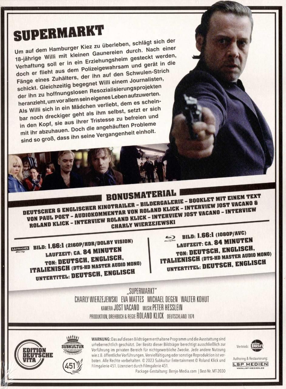Die Rückseite einer DVD-Hülle mit einem Mann, der eine Waffe hält. Text auf Deutsch und Englisch. Bilder des Films sind vorhanden.