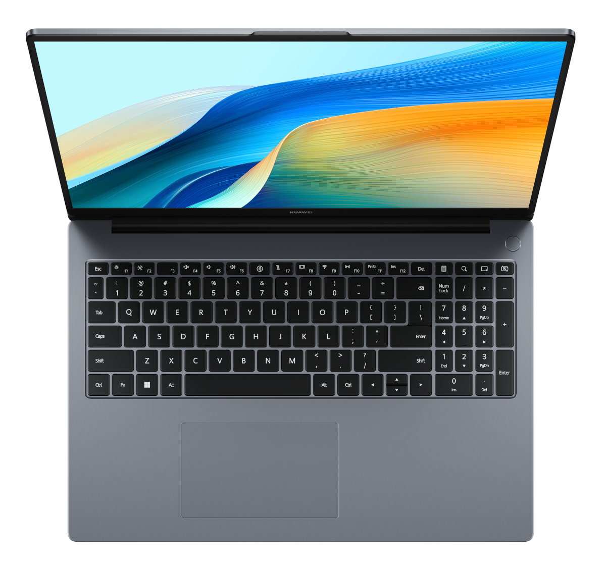 Laptop, widok z góry. Otwarty ekran z abstrakcyjnym designem. Widoczna klawiatura i touchpad.