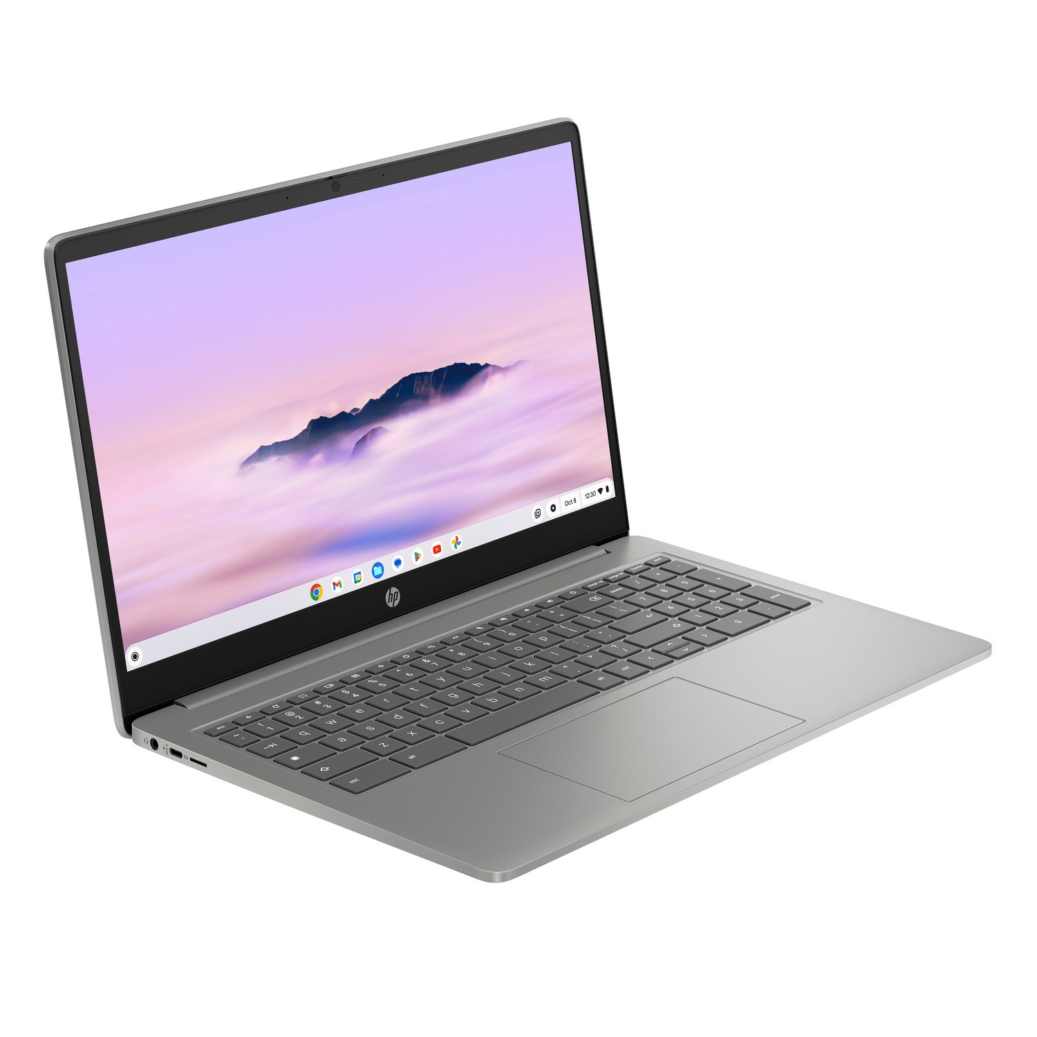 Een zilveren laptop is open. Het scherm toont een lichtpaarse lucht met een bergketen. Het toetsenbord is donkergrijs.